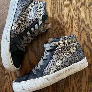 Vintage Havana metallic spotted high top sneakers.